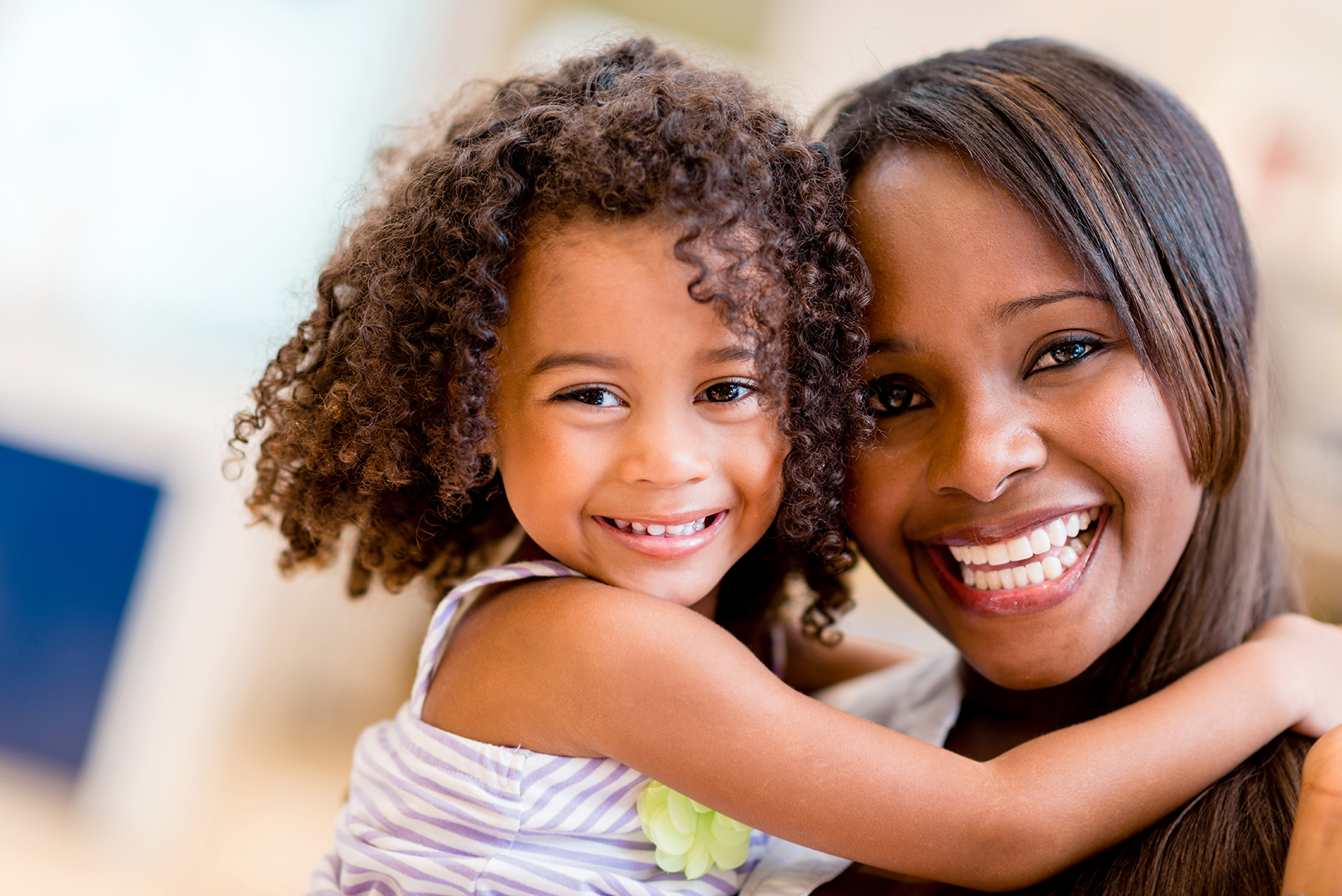 bigstock-Happy-portrait-of-a-mother-and-49730834resized